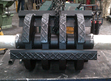 Rotor para molino de martillo con refuerzo en soldadura antidesgaste
